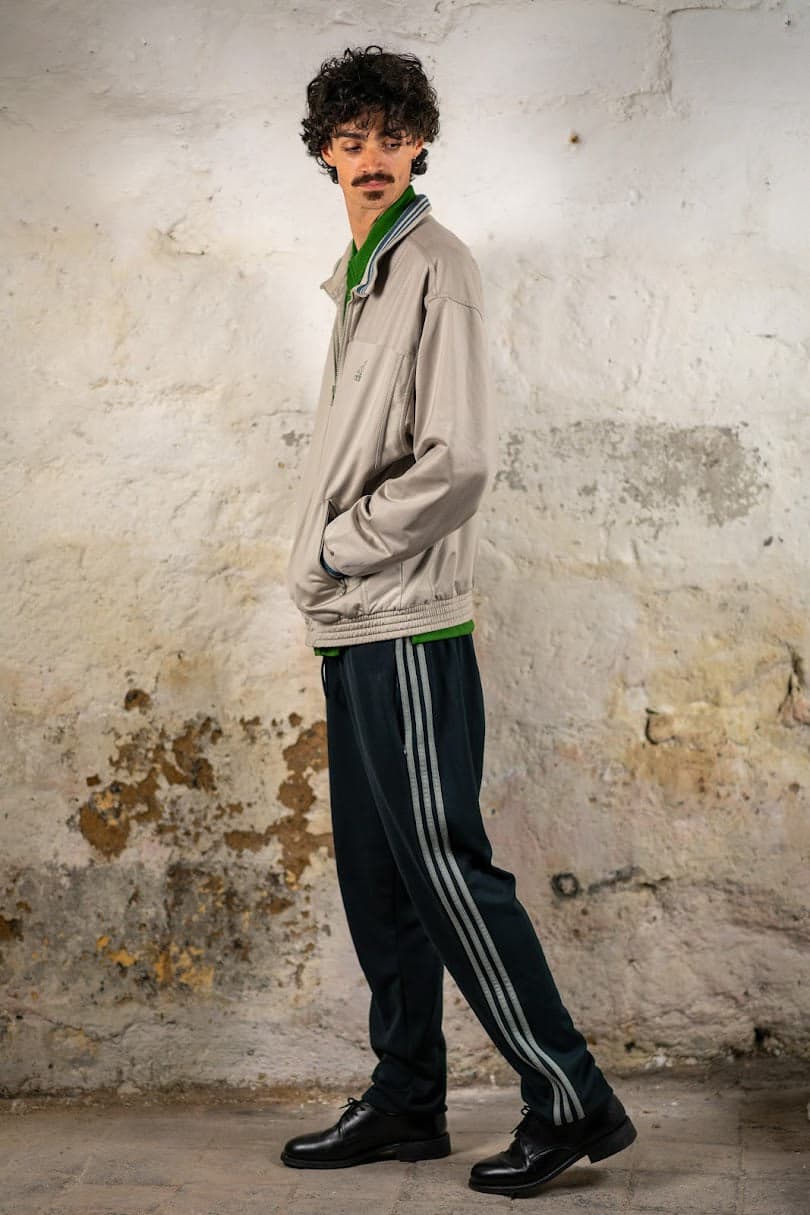 Silver track jacket, in profile