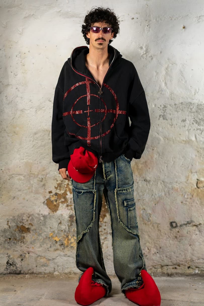 Sequinned target hood with patched denim